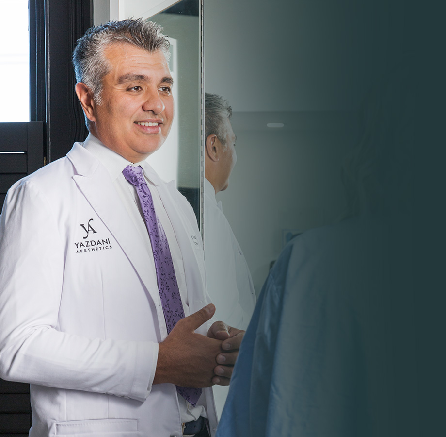 Dr Yazdani consulting with a patient